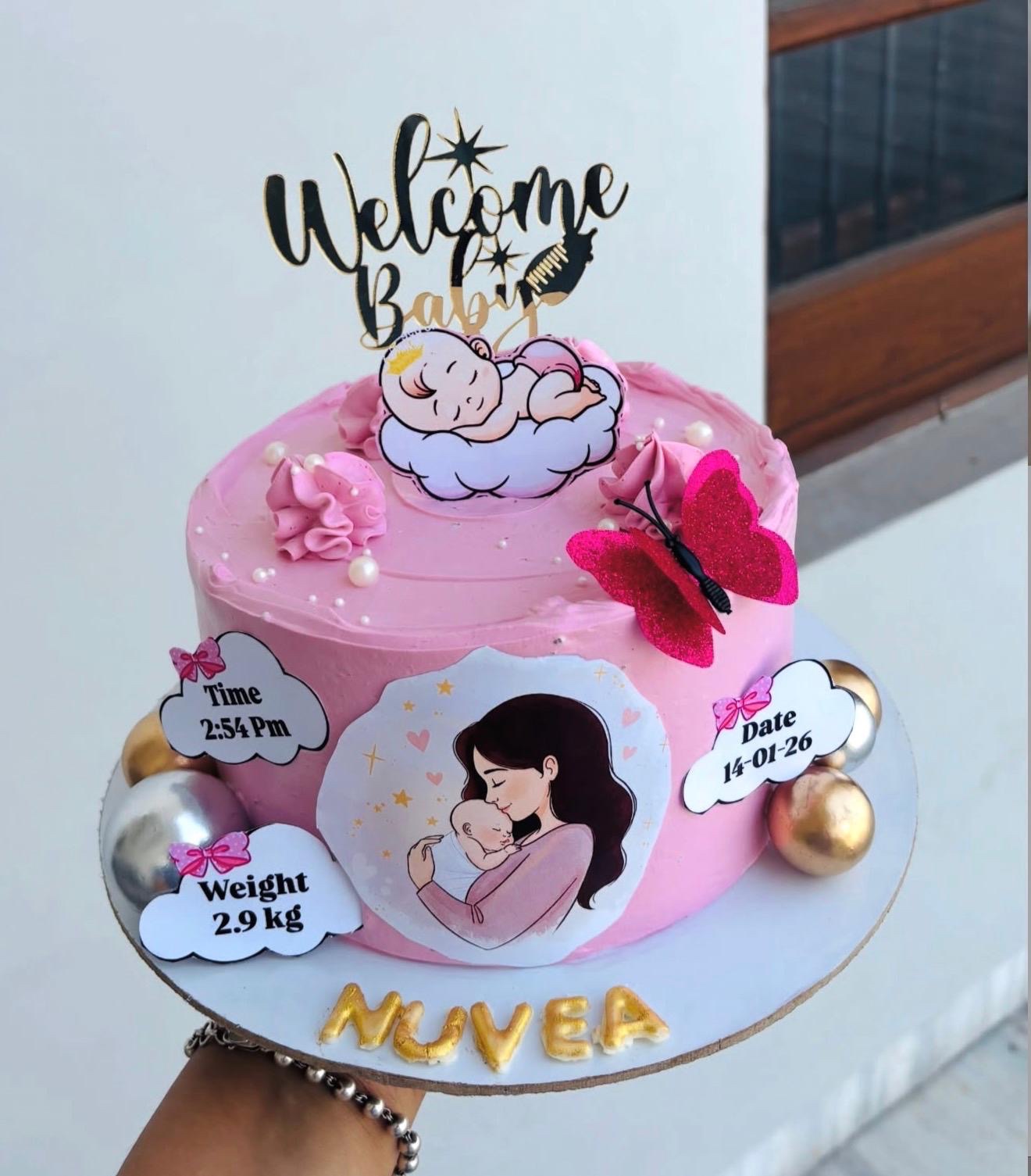Pink welcome baby cake