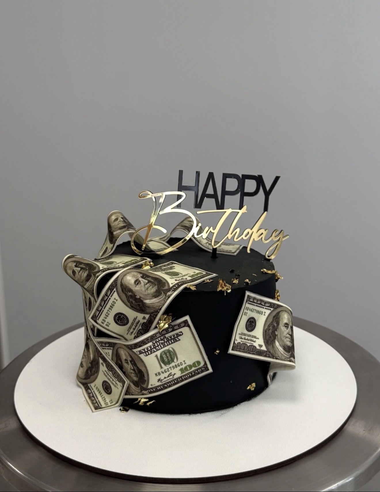 Black money theme birthday cake